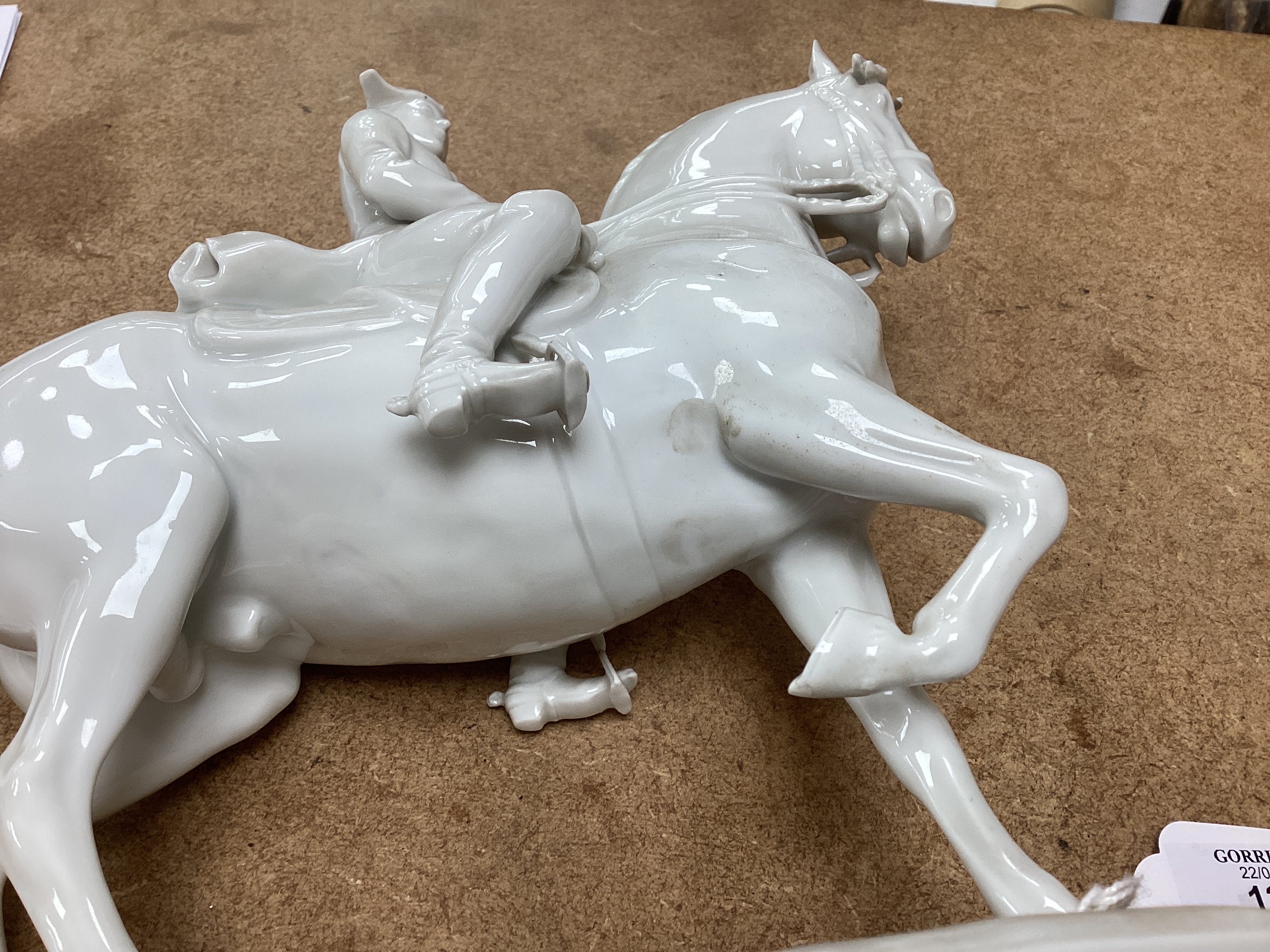 An Augarten, Wien white glazed porcelain Spanish Riding School Group, 24cm